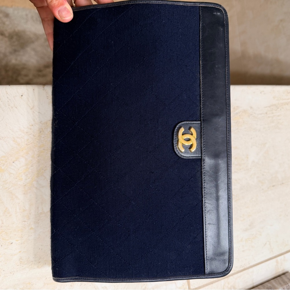 CHANEL Navy and Black quilted jersey clutch with Gold CC with COA